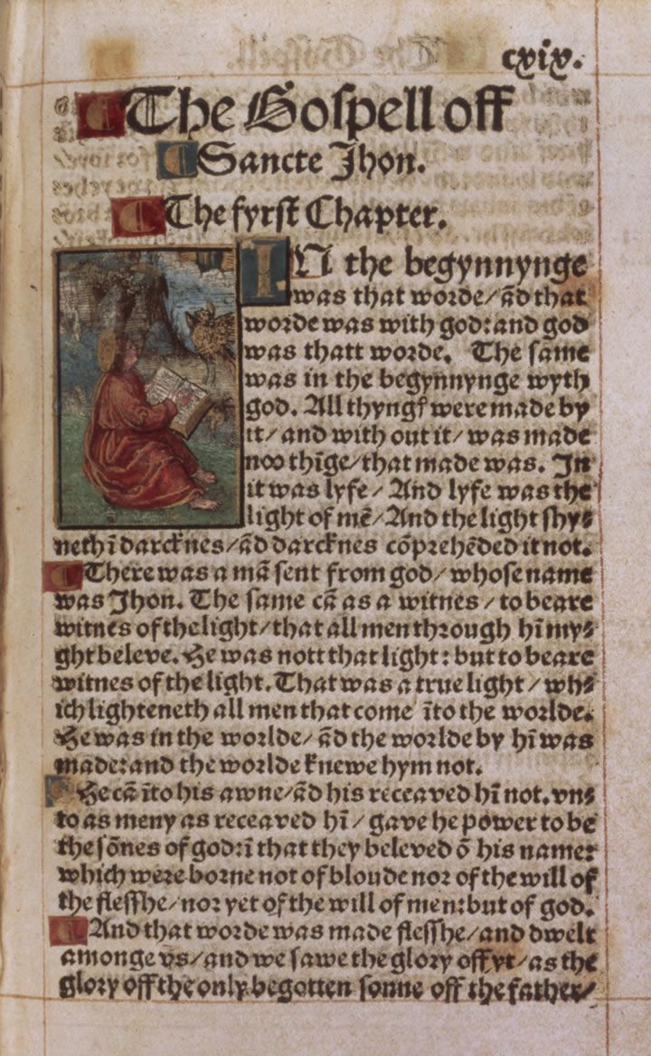 Printed page in black-letter English type, with a large decorated initial at the start of the Gospel of John