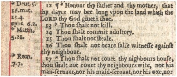 Close view of a few lines of seventeenth century black letter print from the Ten Commandments in Exodus 20 in the 1631 edition known as the Wicked Bible