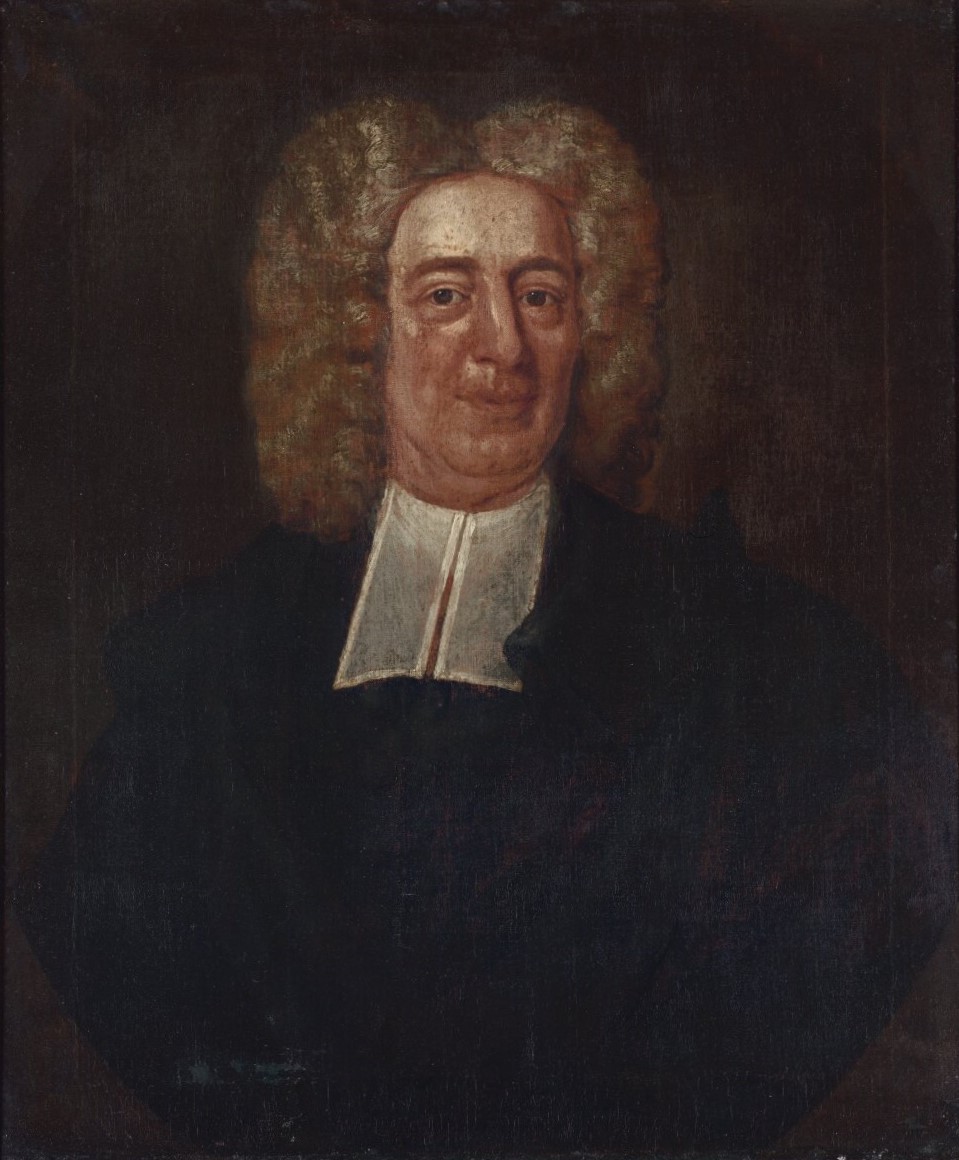 Engraved portrait of a man in a large curled wig, white clerical bands and a dark gown, set in an oval frame with a Latin inscription below