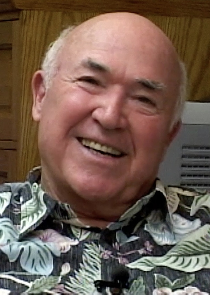 Chuck Smith, an older man, speaking in a still frame from a video series