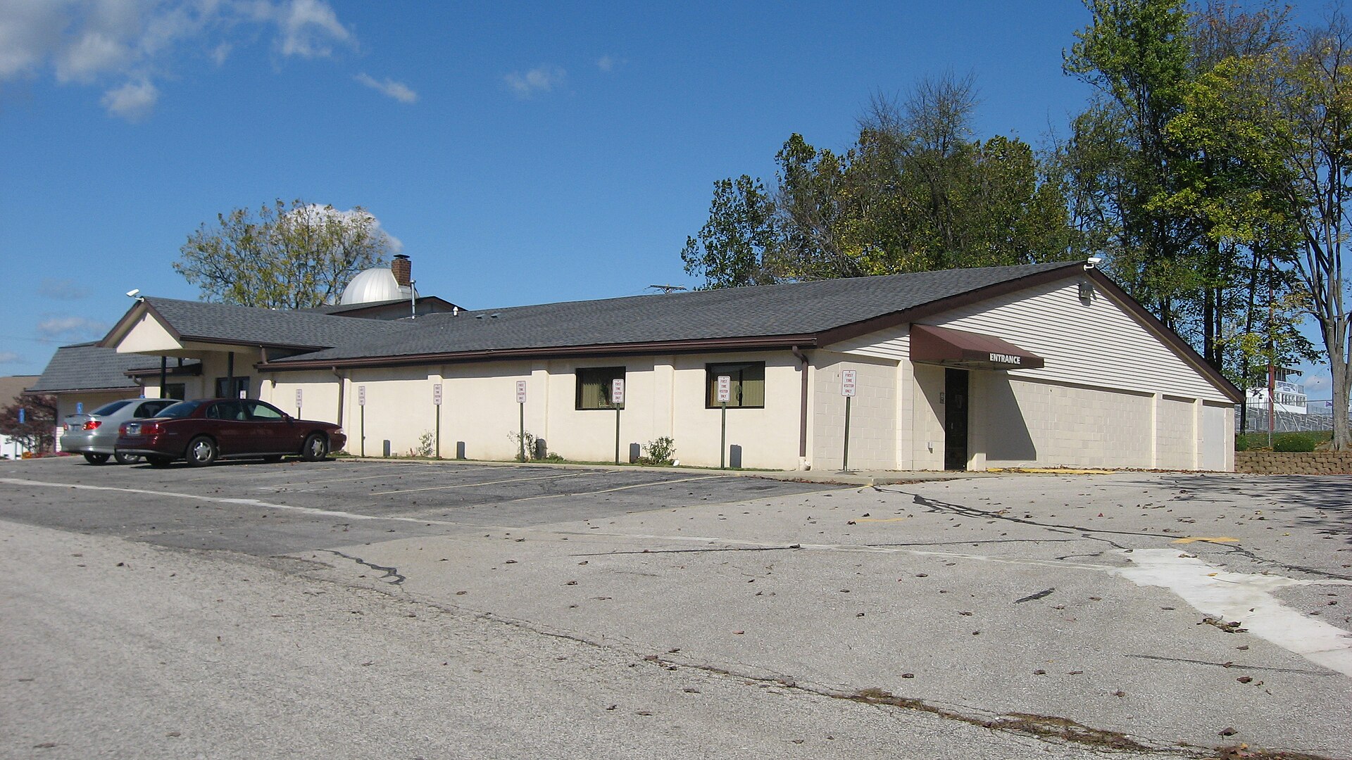 The southern and eastern sides of the Vineyard Christian Fellowship church building in Bloomington, Indiana