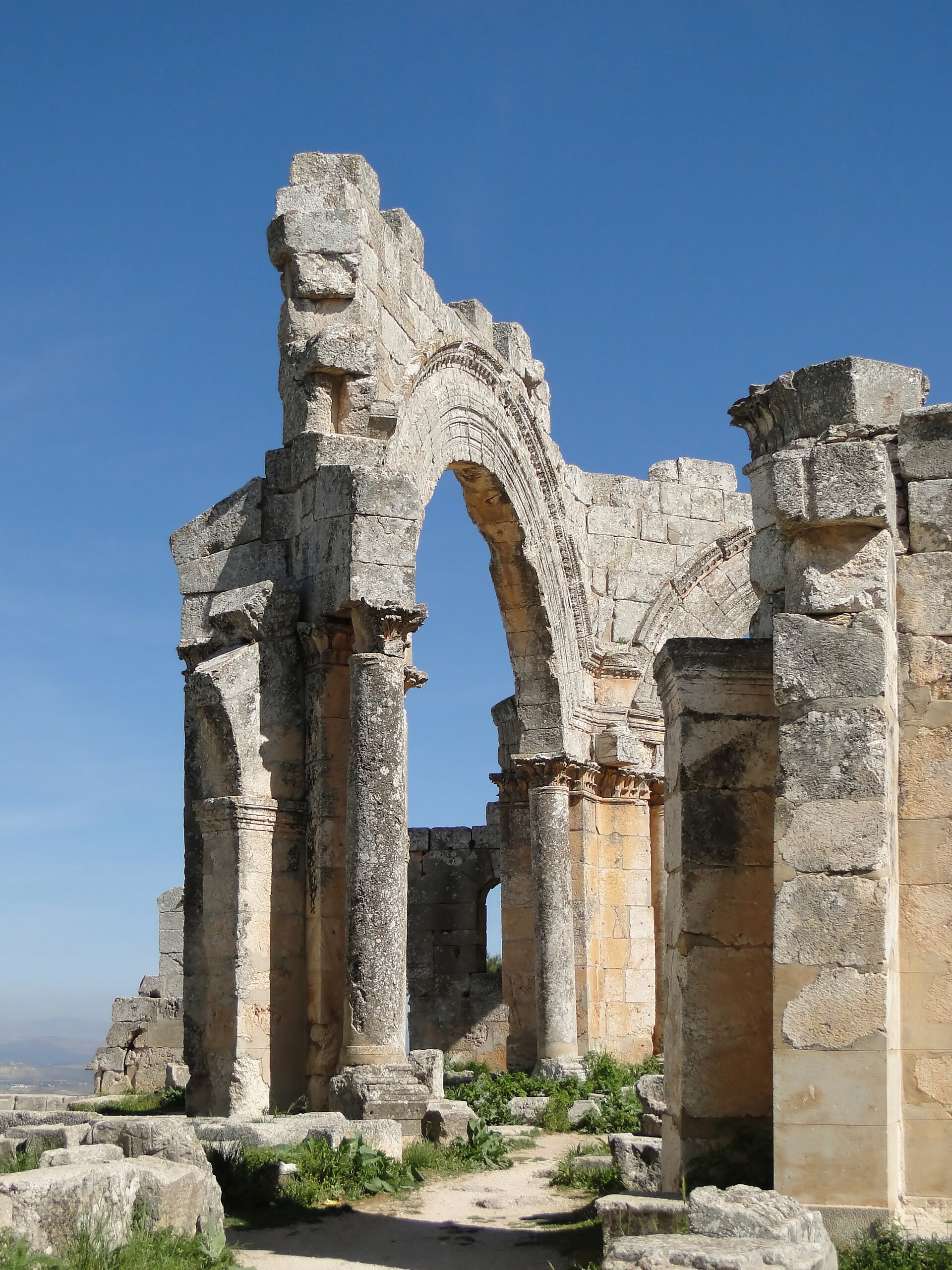 A carved stone arch in the ruined Church of Saint Simeon Stylites in Syria