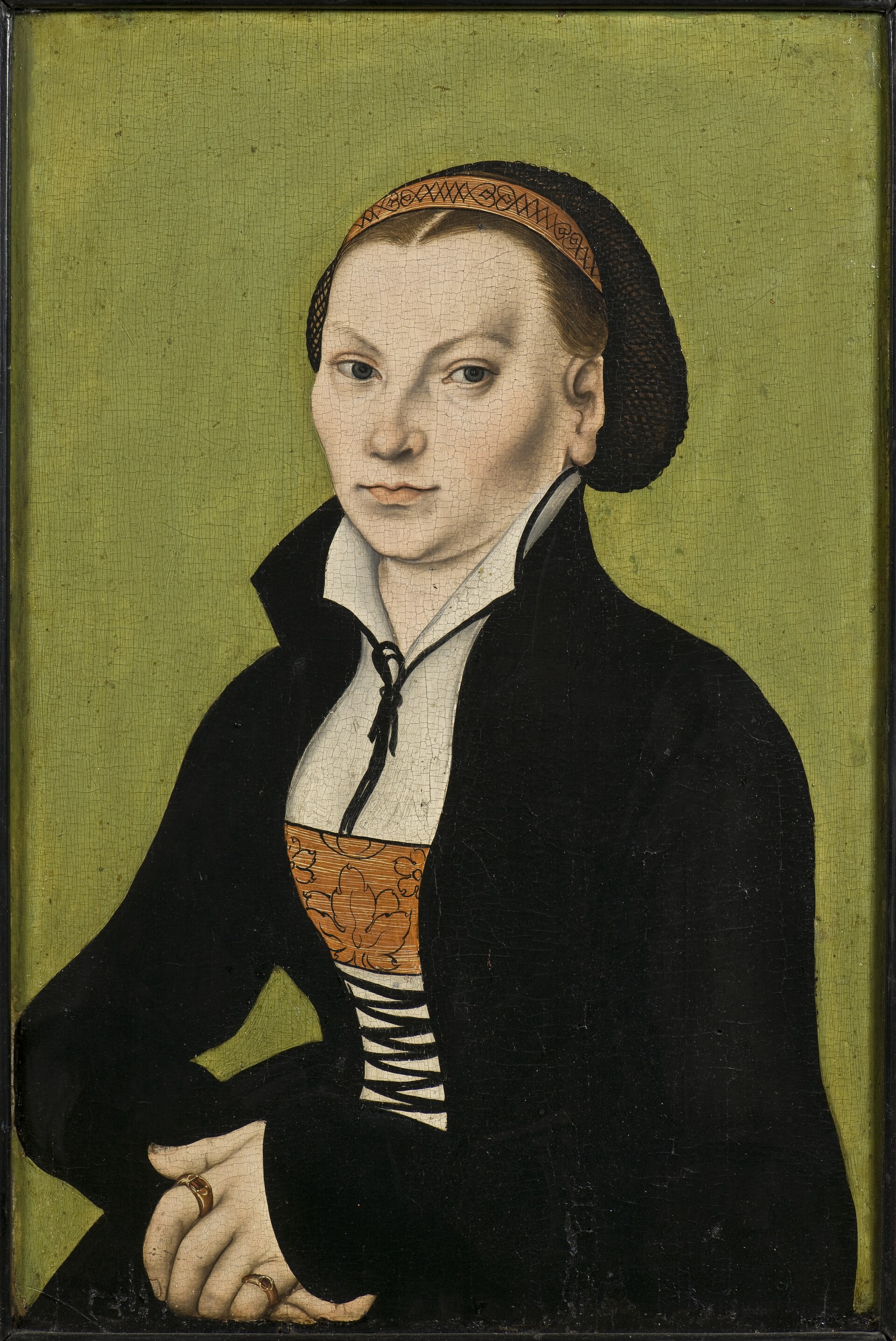 Half-length painted portrait of a young woman in a dark dress with a white high collar and a dark cap over her hair, against a plain blue background