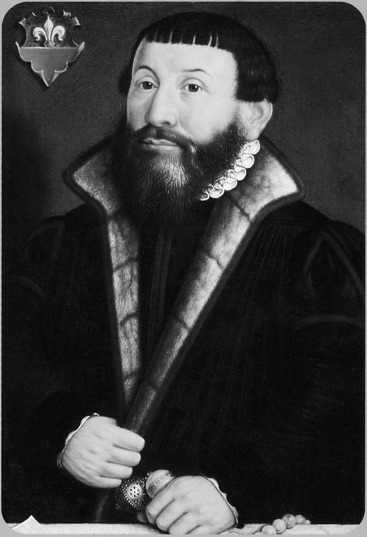 Painted portrait of a bearded man in black robes holding a book, with an inscription above his head
