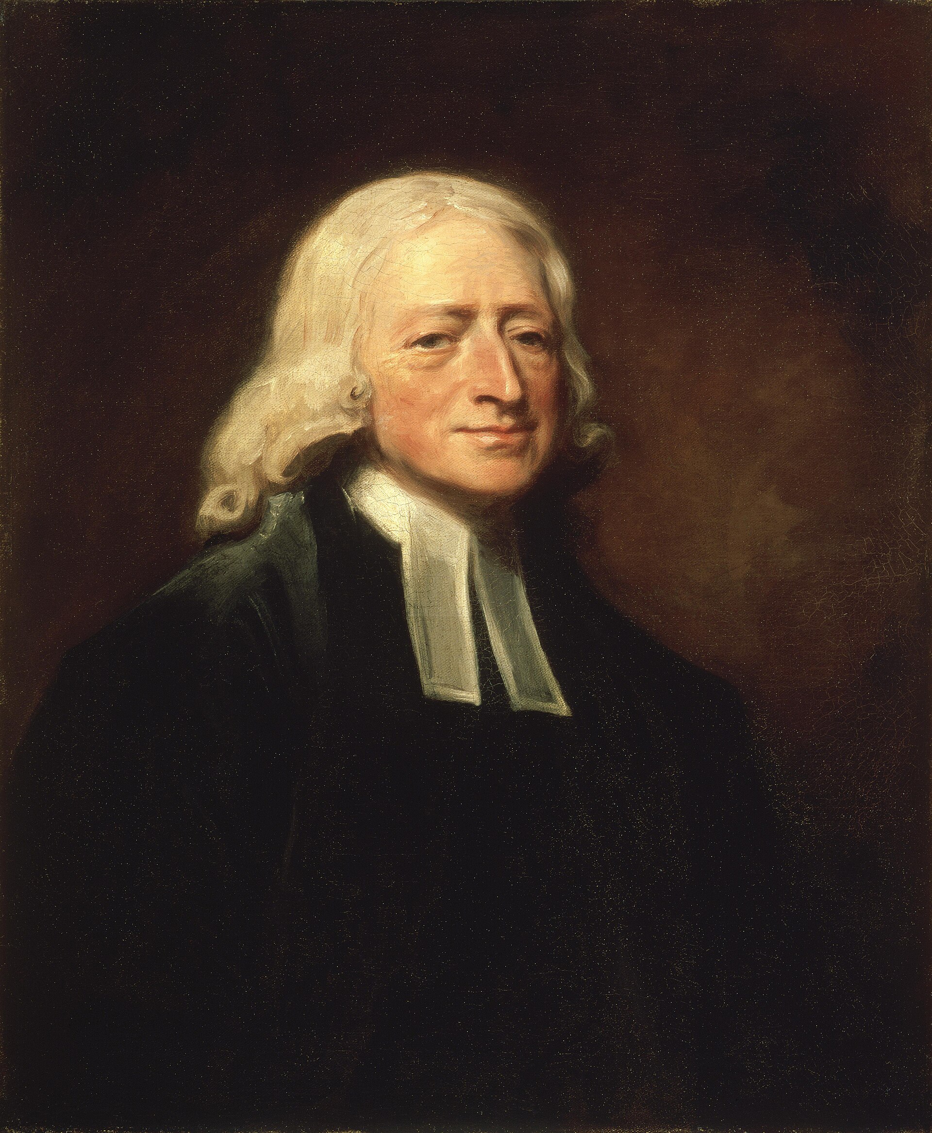Oil portrait of an elderly John Wesley with long white hair, wearing black clerical robes and white preaching bands, against a dark background