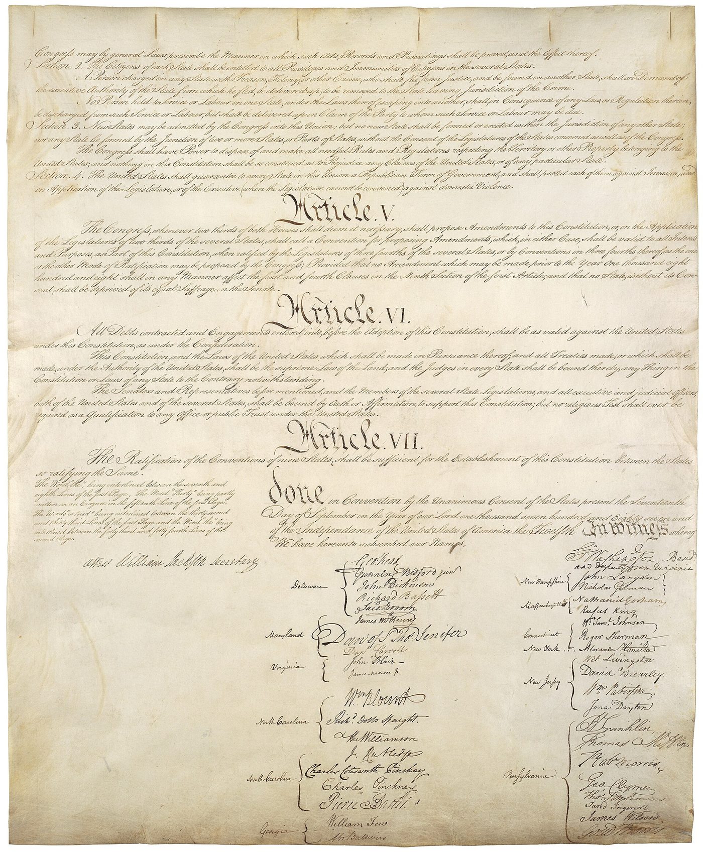 The fourth parchment page of the U.S. Constitution with Articles V through VII and the signers' names