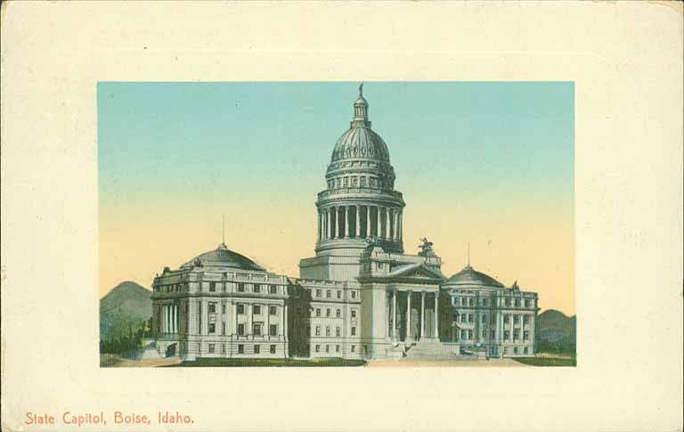 Old postcard view of the domed Idaho State Capitol in Boise with trees and lawn in front