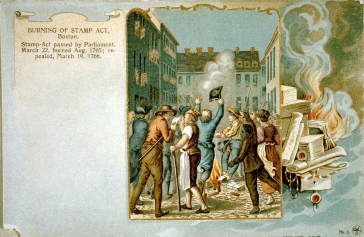 Color postcard showing a crowd in a Boston street watching a bonfire of stamped paper