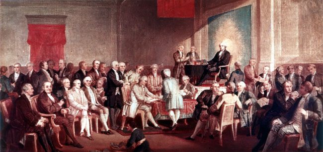 Painting of delegates standing and seated in a large room with Washington on a raised platform