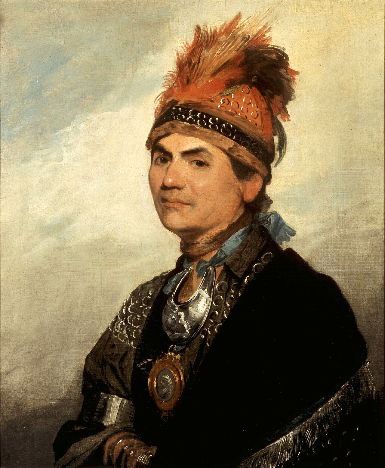 Painted portrait of Joseph Brant, a Mohawk man shown in three-quarter length in Native dress