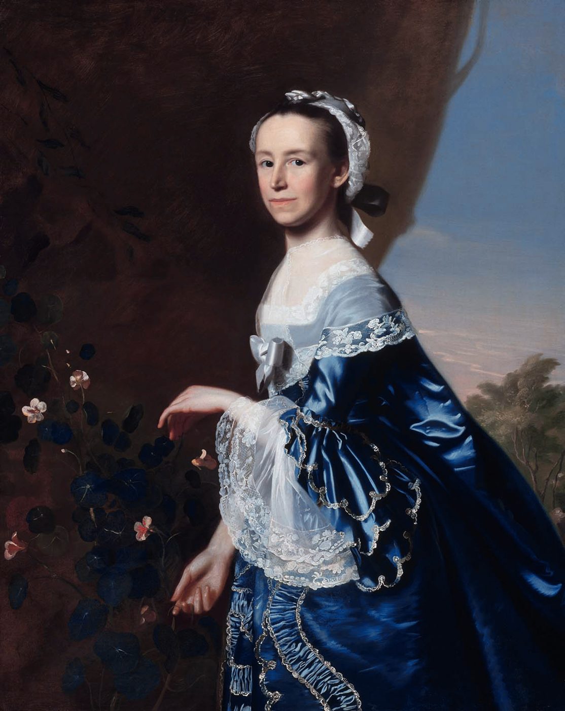 Portrait of Mercy Otis Warren in a blue gown, seated with a calm direct gaze