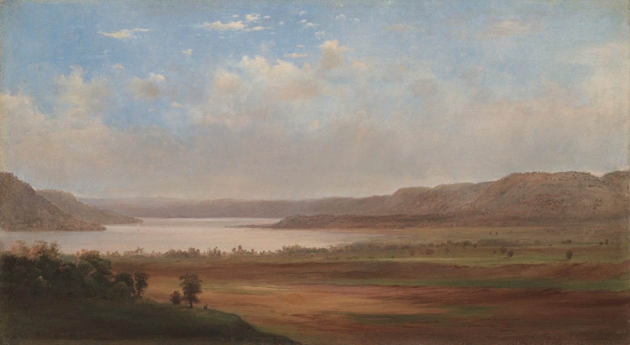 An oil painting of a broad lake between low wooded bluffs under a soft sky, with small figures on the near shore