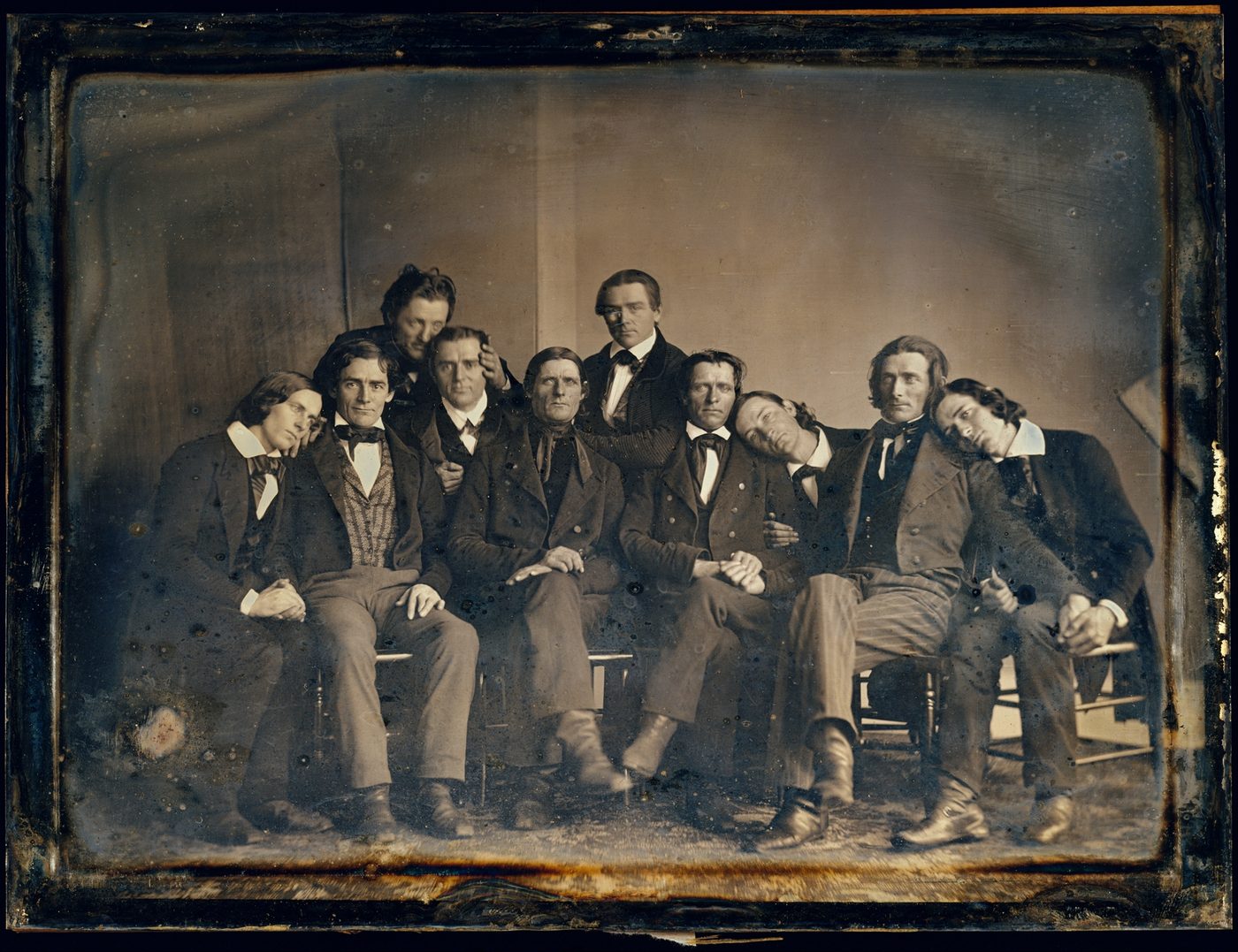 A daguerreotype of the Hutchinson Family Singers, three young men and a young woman, posed together in formal dress