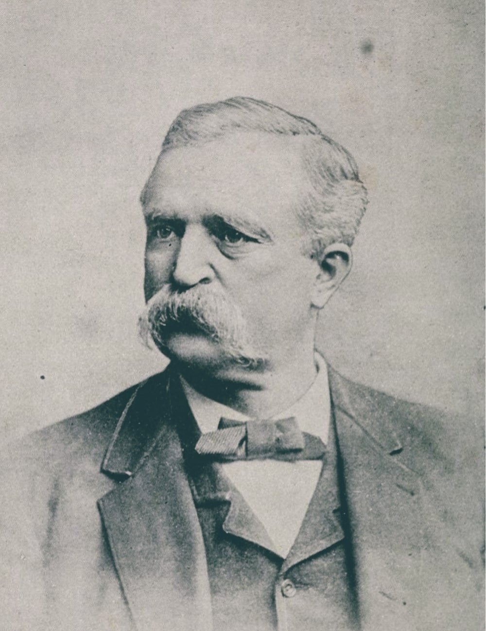 Engraved portrait of James B. Weaver, a bearded man in a dark suit and bow tie, from his 1892 book