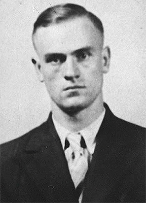 Black and white portrait photograph of a man