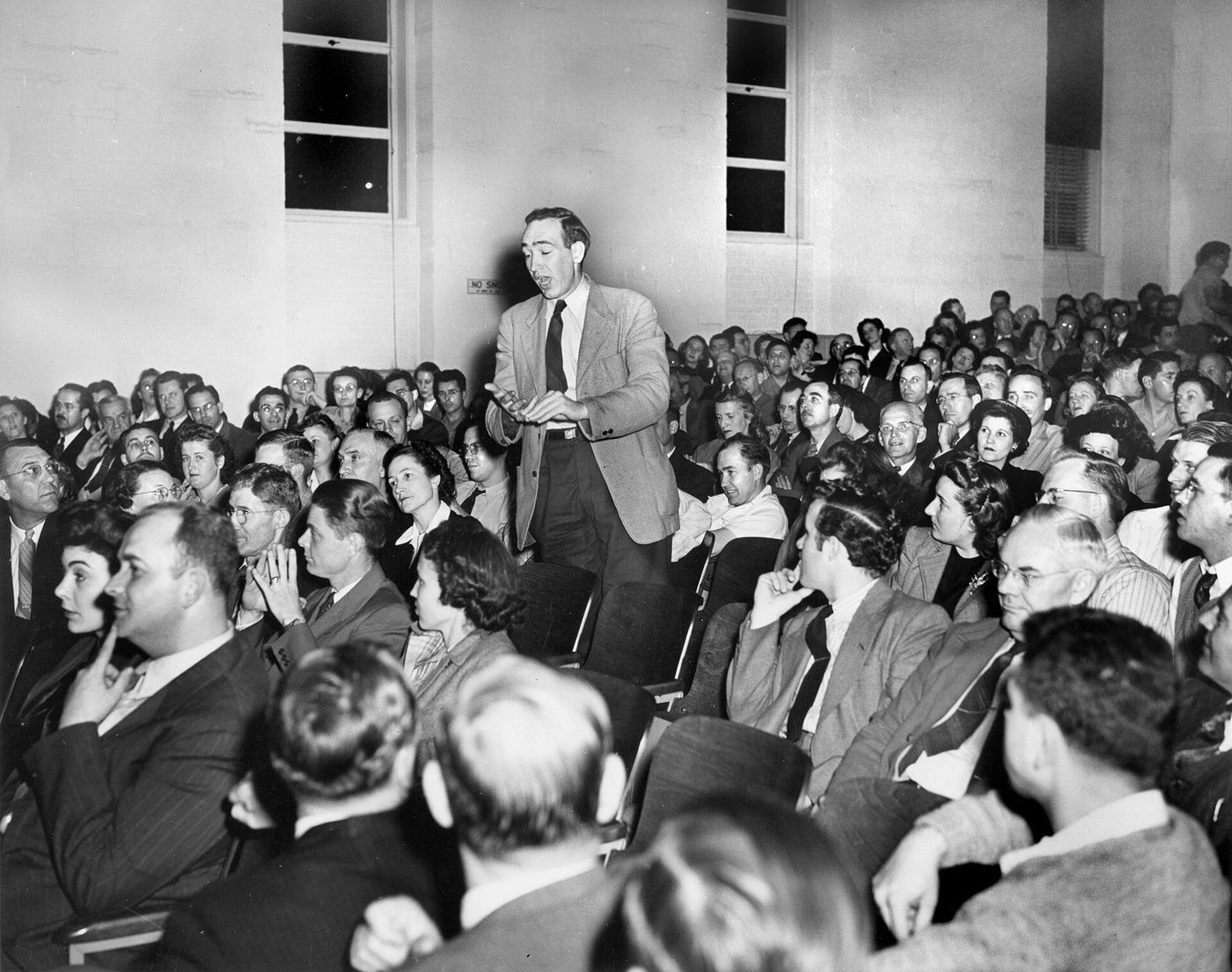 Residents gathered at a 1947 town meeting in Oak Ridge, Tennessee, on a personal property tax