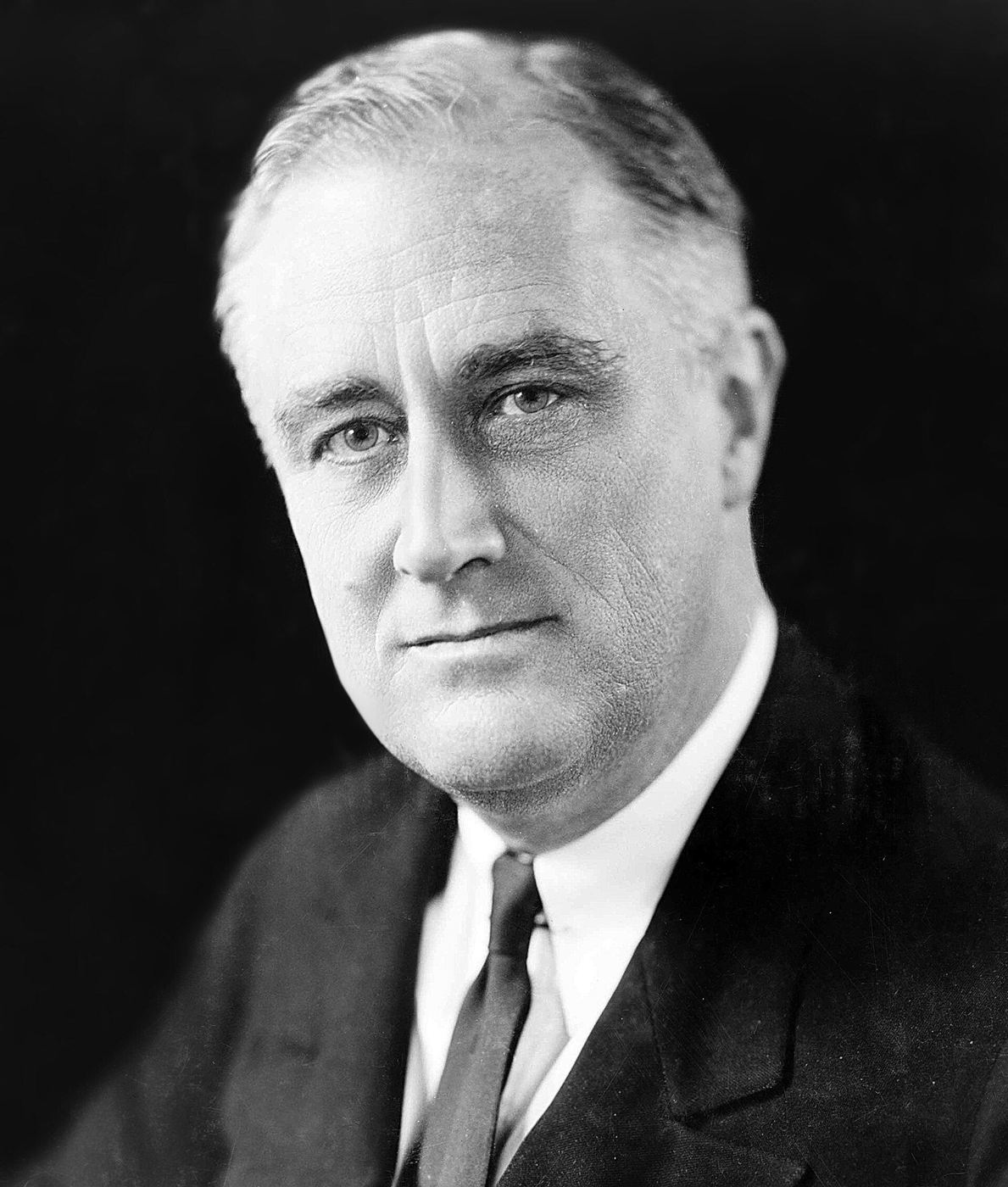 Black and white portrait photograph of Franklin D. Roosevelt in a suit, 1933